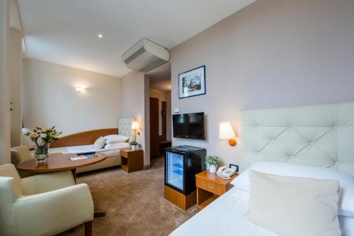 Imagen de la habitación del Hotel Central, Zagreb. Foto 4