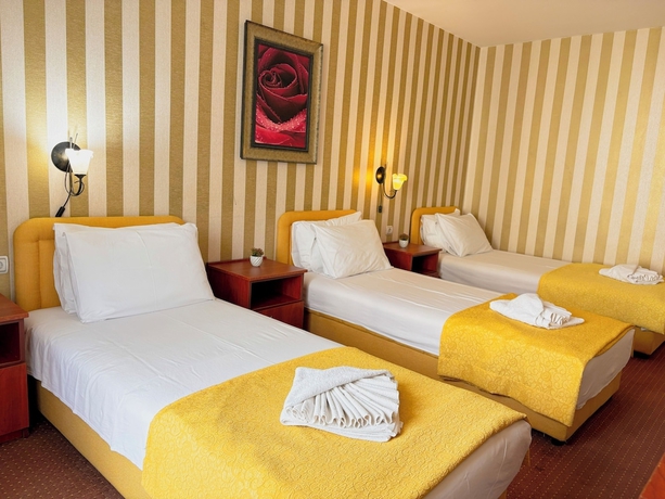 Imagen de la habitación del Hotel Central and Restaurant. Foto 2