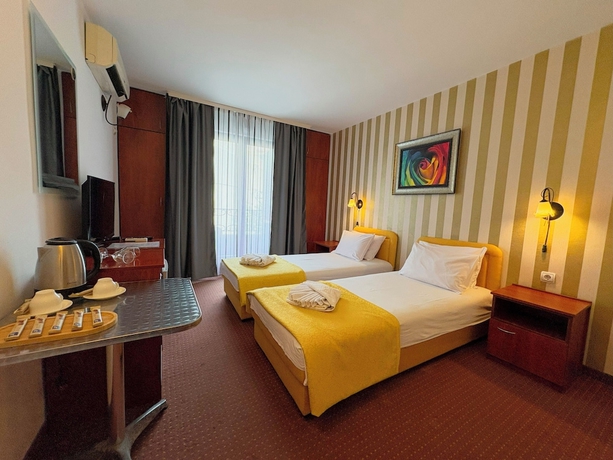 Imagen de la habitación del Hotel Central and Restaurant. Foto 4