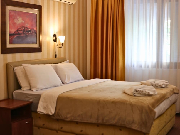 Imagen de la habitación del Hotel Central and Restaurant. Foto 8