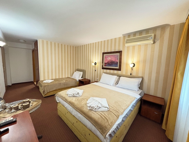Imagen de la habitación del Hotel Central and Restaurant. Foto 9