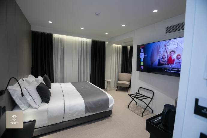 Imagen de la habitación del Hotel CentralInn Tirana. Foto 19