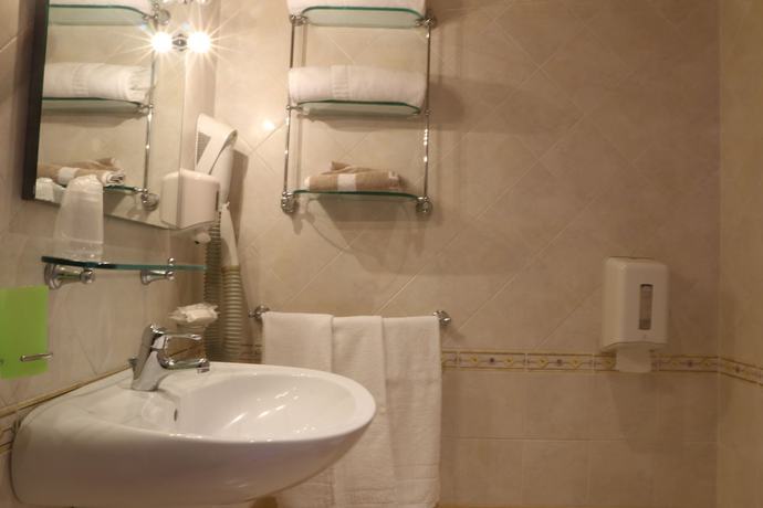 Imagen de la habitación del Hotel Centrale, Gambarie. Foto 6