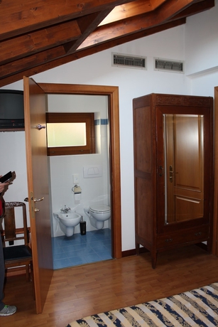 Imagen de la habitación del Hotel Centrale, Pescallo. Foto 15