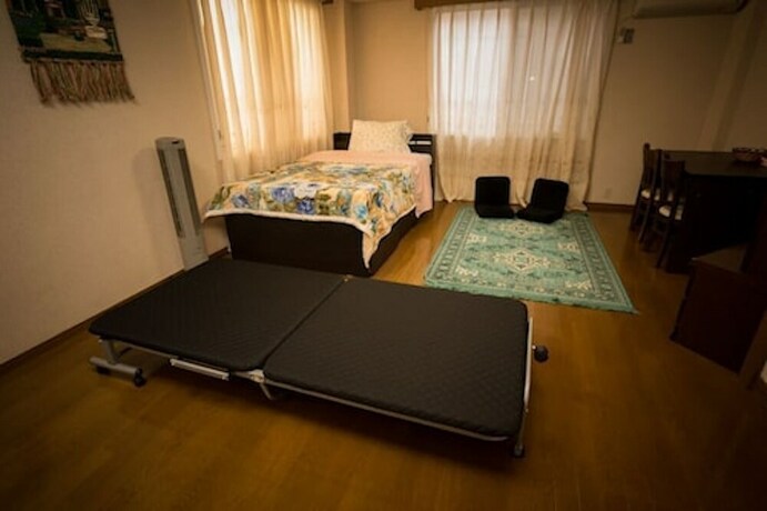 Imagen de la habitación del Hotel Centrally Located Deluxe Furnished.4. Foto 20