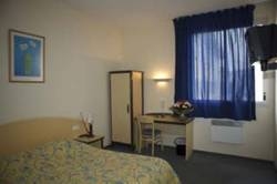 Imagen de la habitación del Hotel Centre Regain. Foto 2