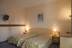 Imagen de la habitación del Hotel Centre Regain. Foto 3