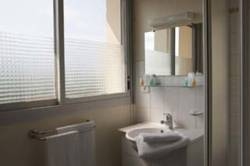 Imagen de la habitación del Hotel Centre Regain. Foto 4