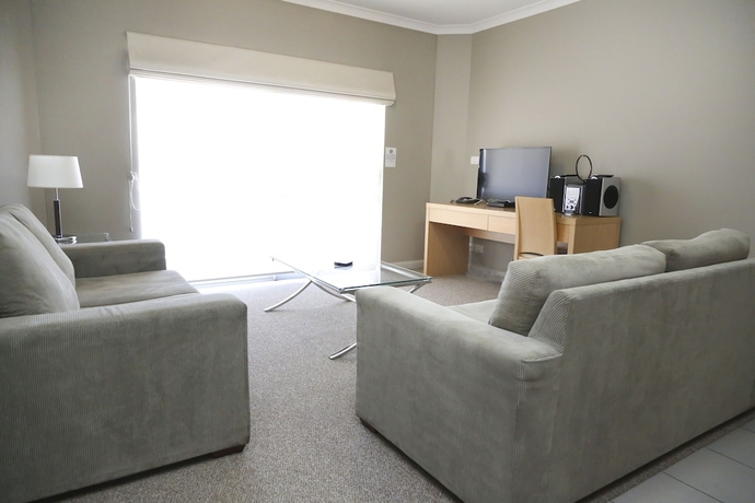Imagen de la habitación del Hotel Centrepoint Apartments. Foto 14