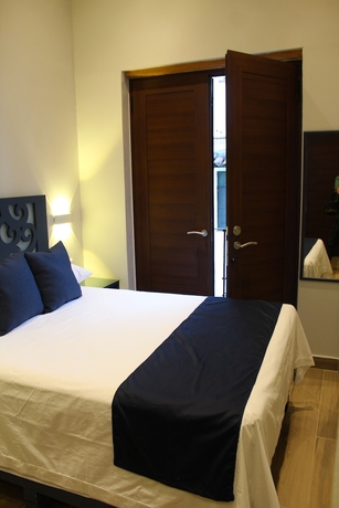 Imagen de la habitación del Hotel Centrico House. Foto 5