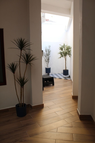 Imagen de la habitación del Hotel Centrico House. Foto 7