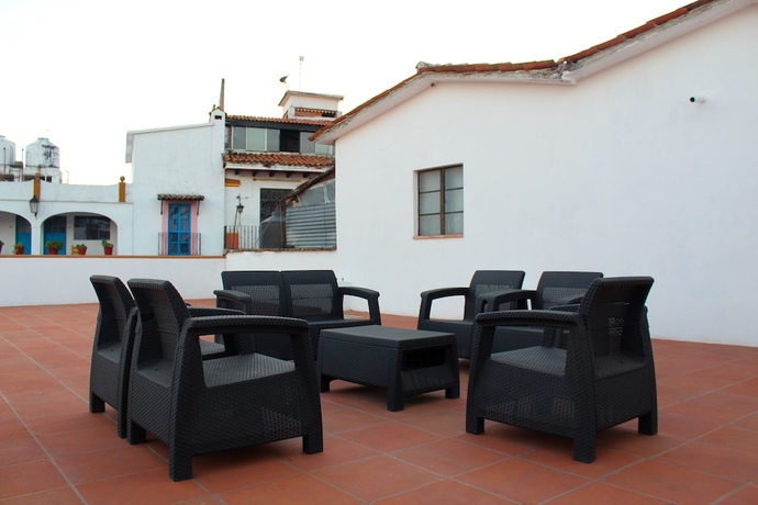 Imagen de la habitación del Hotel Centrico House. Foto 8