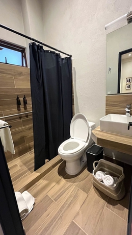 Imagen de la habitación del Hotel Centrico House. Foto 10