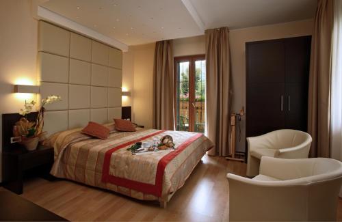 Imagen de la habitación del Hotel Centro Benessere Gardel. Foto 7