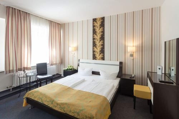 Imagen de la habitación del Hotel Centro City Gate. Foto 13