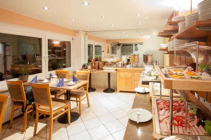 Imagen del bar/restaurante del Hotel Centro Hotel Mondial Munchen Trademark Collection by Wyndham. Foto 3