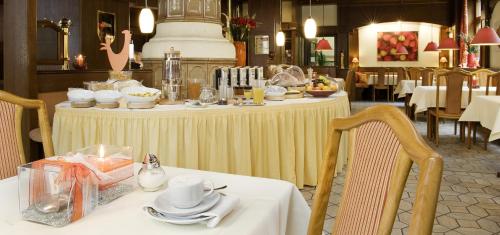 Imagen del bar/restaurante del Hotel Centro Hotel Sautter, Trademark Collection by Wyndham. Foto 2