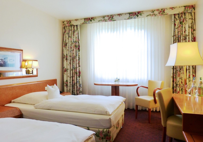 Imagen de la habitación del Hotel Centro Residence. Foto 15