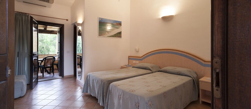 Imagen de la habitación del Hotel Centro Vacanza Isuledda. Foto 10