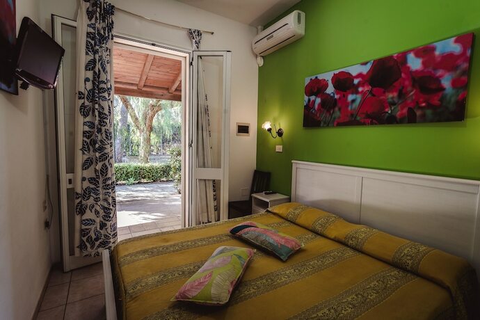 Imagen de la habitación del Hotel Centro Vacanze Mulino D'acqua. Foto 18