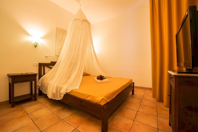 Imagen de la habitación del Hotel Centro Vacanze Poker. Foto 12