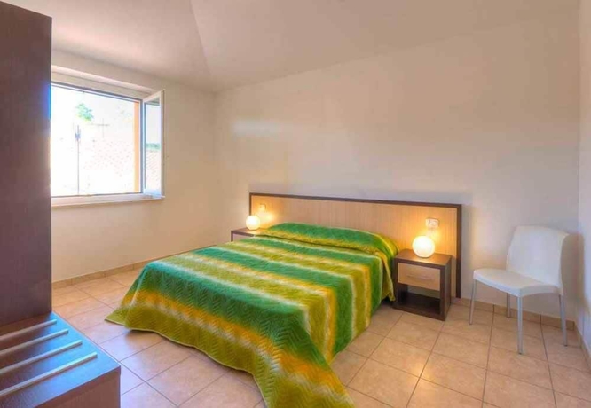 Imagen de la habitación del Hotel Centro Vacanze Verde Azzurro. Foto 3