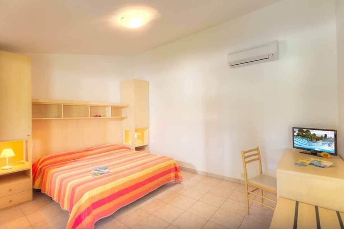 Imagen de la habitación del Hotel Centro Vacanze Verde Azzurro. Foto 4