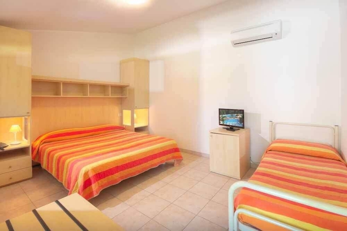 Imagen de la habitación del Hotel Centro Vacanze Verde Azzurro. Foto 5