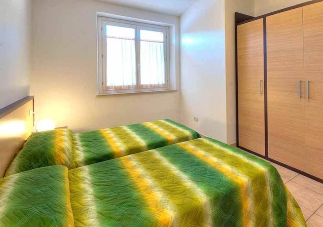 Imagen de la habitación del Hotel Centro Vacanze Verde Azzurro. Foto 6