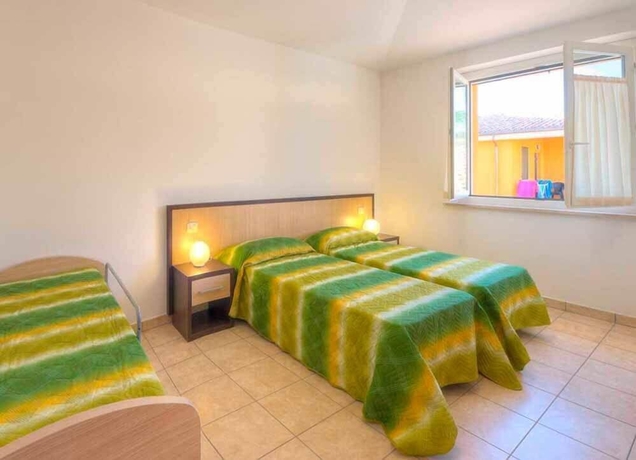 Imagen de la habitación del Hotel Centro Vacanze Verde Azzurro. Foto 7