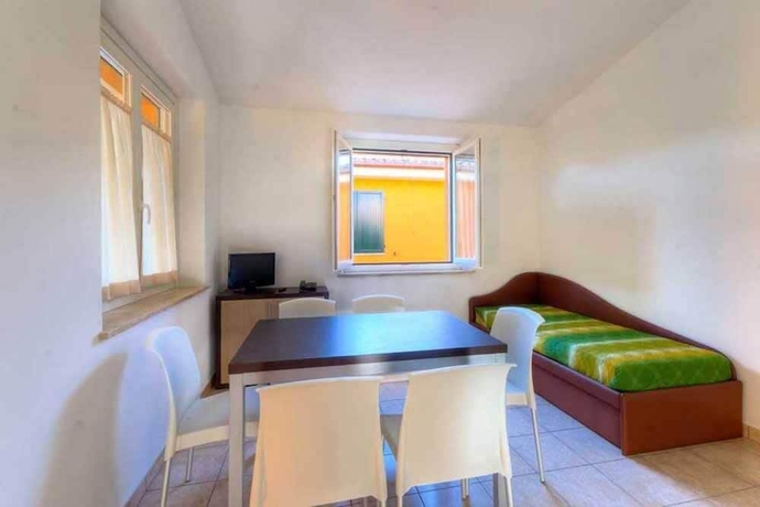 Imagen de la habitación del Hotel Centro Vacanze Verde Azzurro. Foto 13