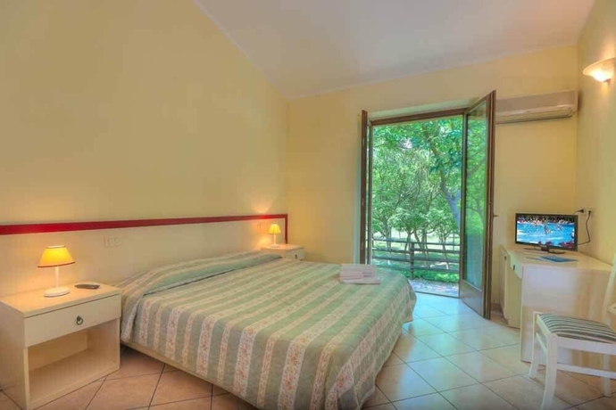Imagen de la habitación del Hotel Centro Vacanze Verde Azzurro. Foto 14