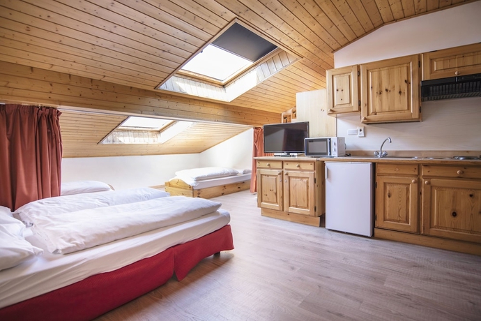 Imagen de la habitación del Hotel Centro Vacanze Veronza Clubresidence. Foto 8