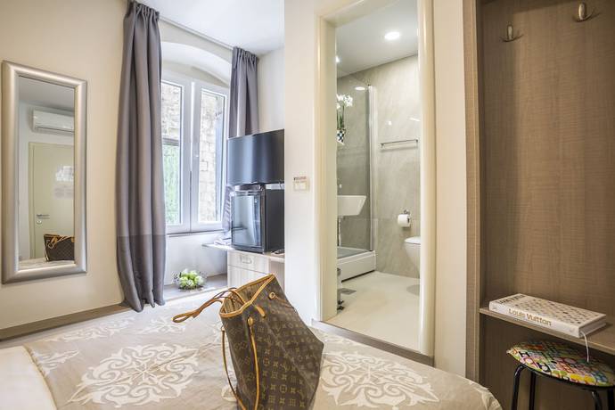 Imagen de la habitación del Hotel Centro di Centri Rooms. Foto 10