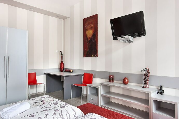 Imagen de la habitación del Hotel Centrooms. Foto 13