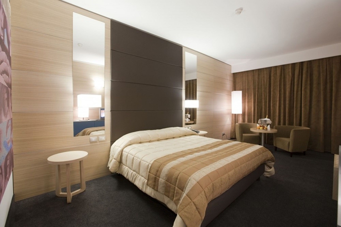 Imagen de la habitación del Hotel Centrum Palace. Foto 12