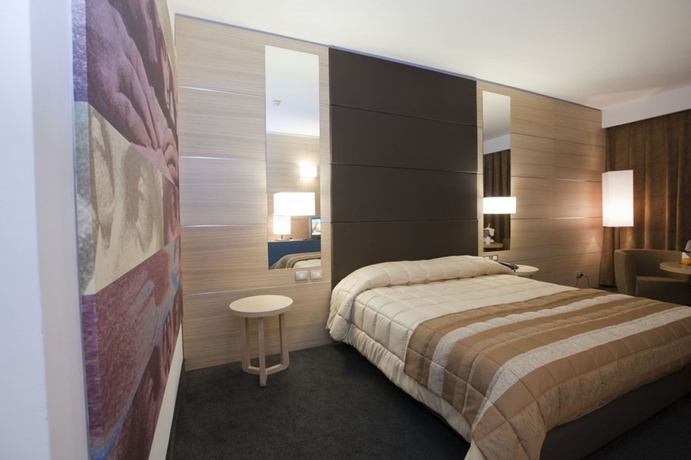 Imagen de la habitación del Hotel Centrum Palace. Foto 13