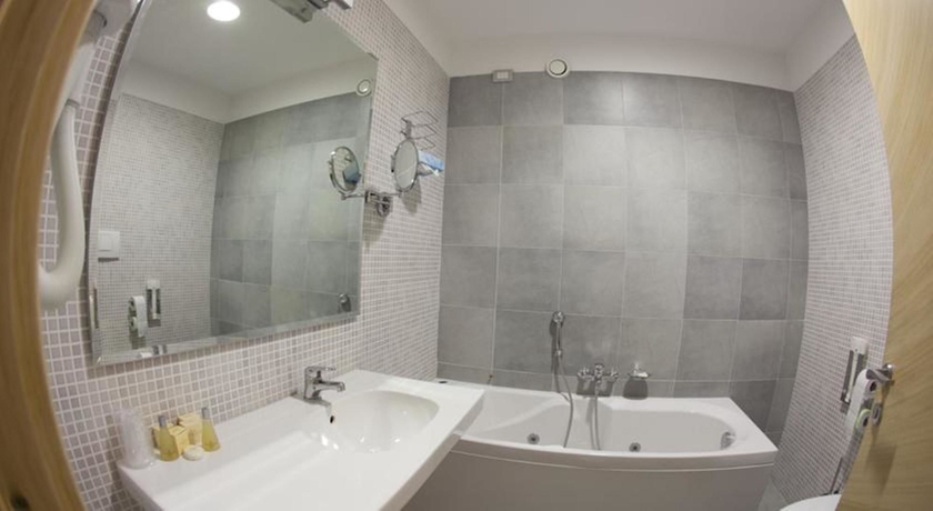 Imagen de la habitación del Hotel Centrum Palace. Foto 15