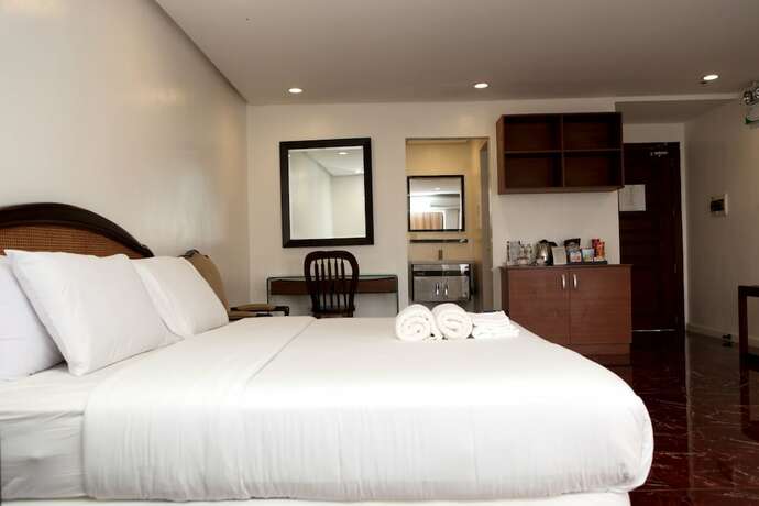 Imagen de la habitación del Hotel Centtro Residences. Foto 18