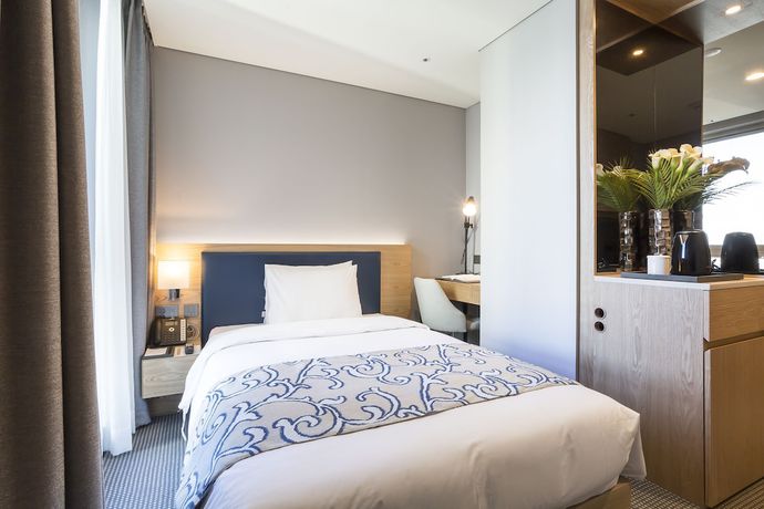 Imagen de la habitación del Hotel Centum Primus. Foto 7