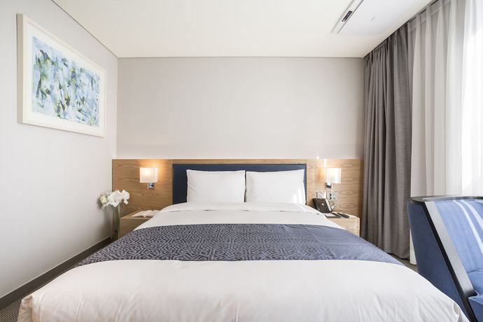 Imagen de la habitación del Hotel Centum Primus. Foto 17