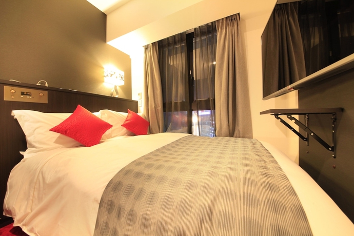 Imagen de la habitación del Hotel Centurion Ikebukuro. Foto 13