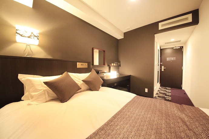 Imagen de la habitación del Hotel Centurion Ikebukuro. Foto 14