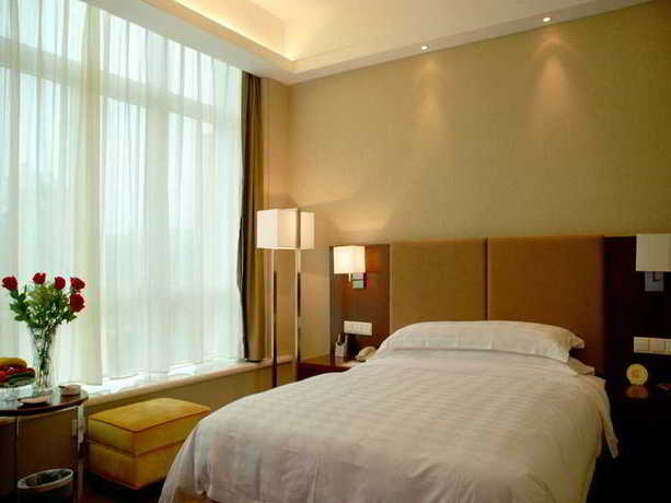 Imagen de la habitación del Hotel Century Huatian. Foto 1
