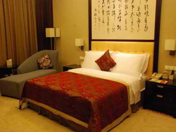 Imagen de la habitación del Hotel Century Huatian. Foto 2