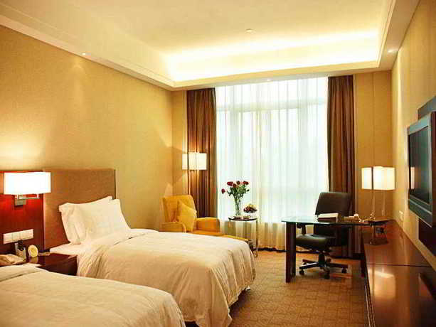Imagen de la habitación del Hotel Century Huatian. Foto 3