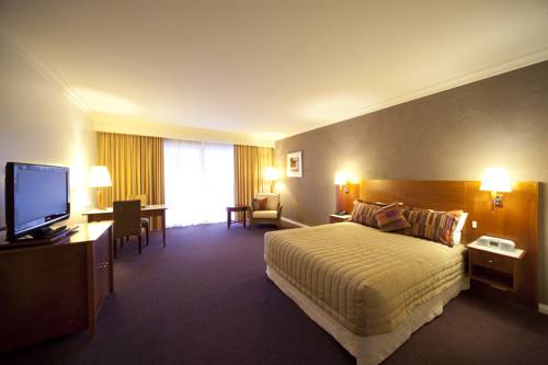 Imagen de la habitación del Hotel Century Inn. Foto 2