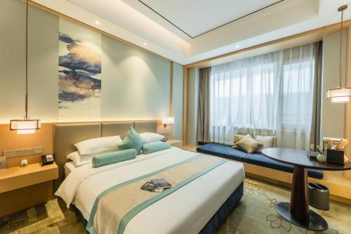 Imagen de la habitación del Hotel Century Runhua. Foto 12