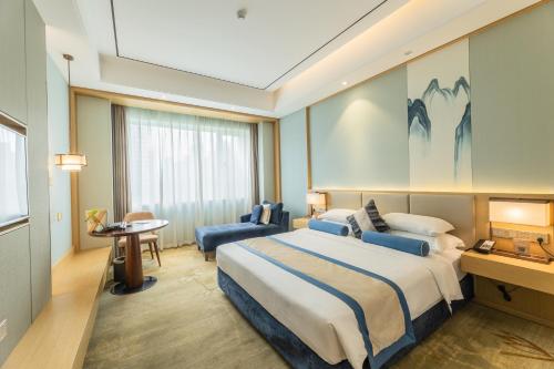 Imagen de la habitación del Hotel Century Runhua. Foto 15