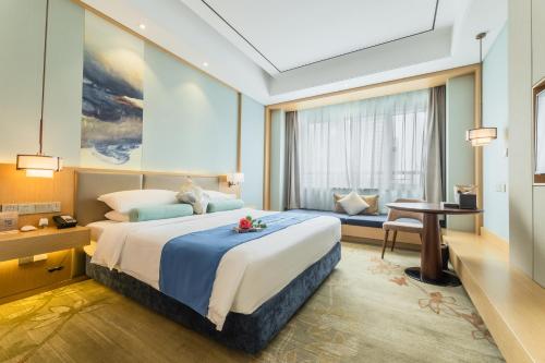 Imagen de la habitación del Hotel Century Runhua. Foto 18